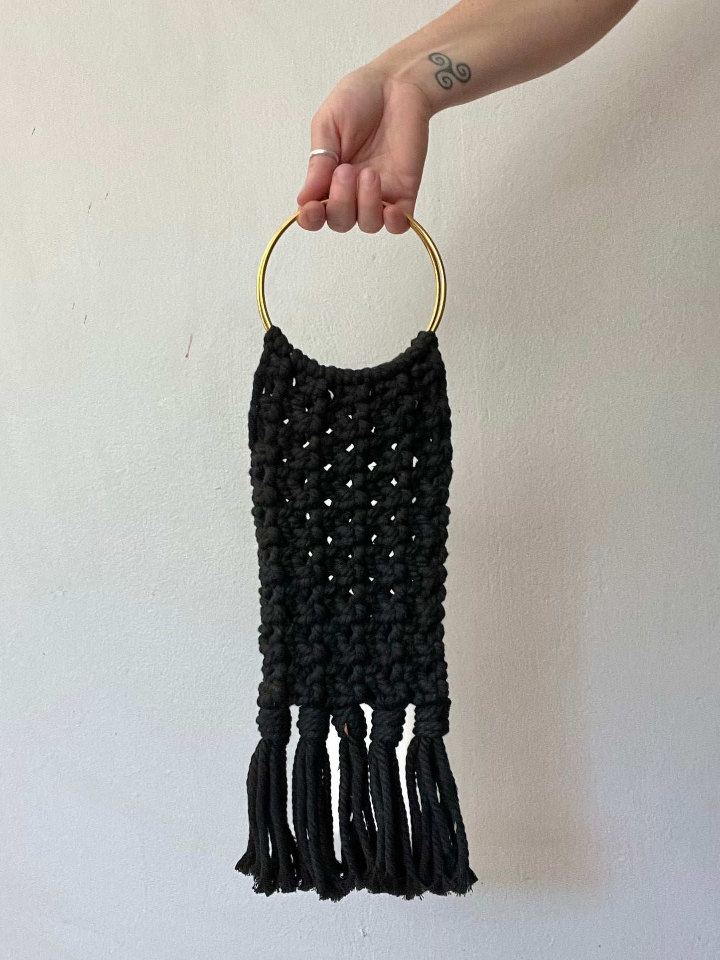 black macrame handbag
