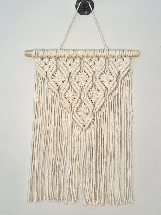 small symmetrical wall hanging